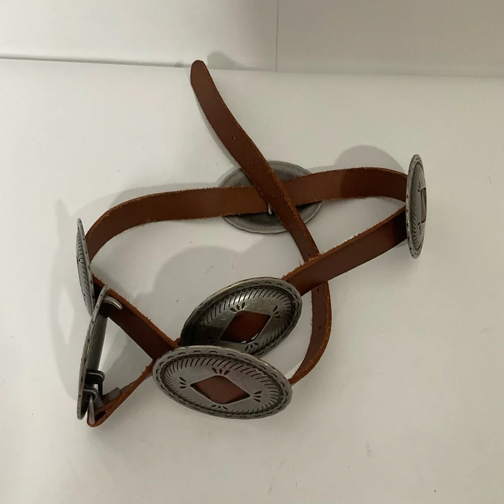 Vintage western brown leather belt; silver medallions; adjustable strap; ~37” L